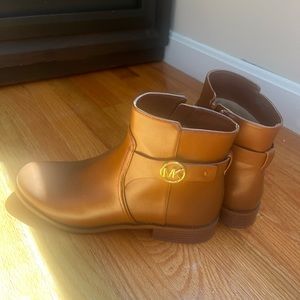 MK never worn booties. Size 10